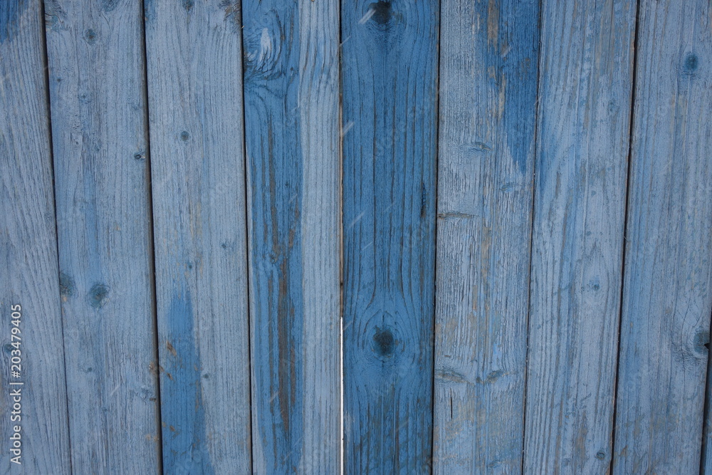 Naklejka premium The texture of old wood. Weathered piece of wood. Background of old wood.