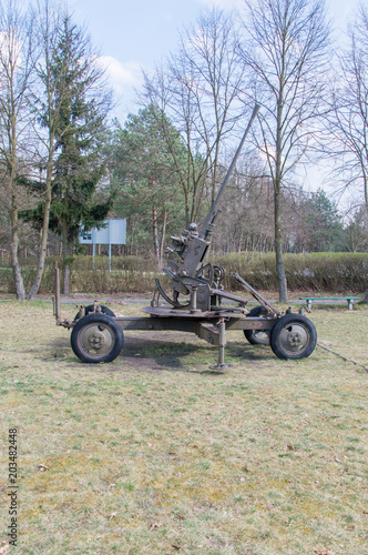 Historical gun near a war memorial for soldiers of the Soviet army and the army of the Polish army near DK801 road.