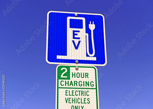 Electric Vehicle charging sign, a power source eventually expected to replace fossil fuels such as gasoline and oil in operating a car and other motor vehicles