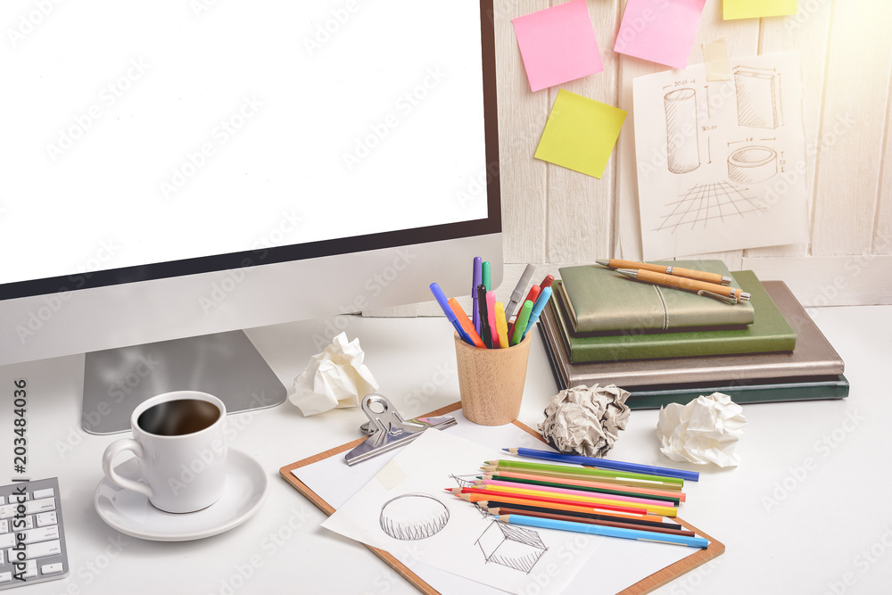workplace background for designers with Blank white screen modern desktop computer. workplace background for designers with Blank white screen modern desktop computer.