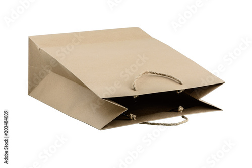 Blank brown paper bag isolated on white background