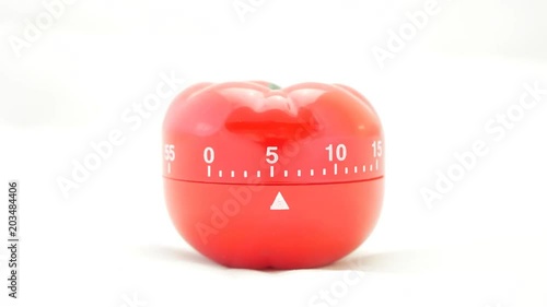 Kitchen timer countdown of 30 minutes, time lapse in studio on white background