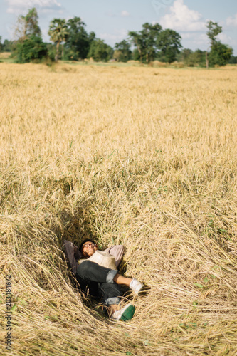 Brown Skin Farmer And His Rice Field
