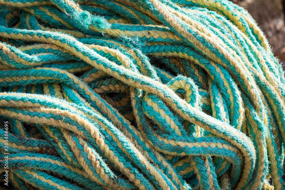 texture background of wiggled green rope on the dock 