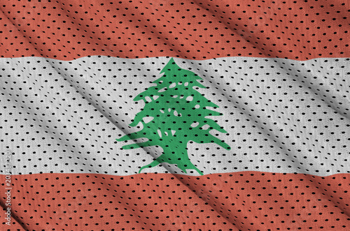 Lebanon flag printed on a polyester nylon sportswear mesh fabric with some folds photo