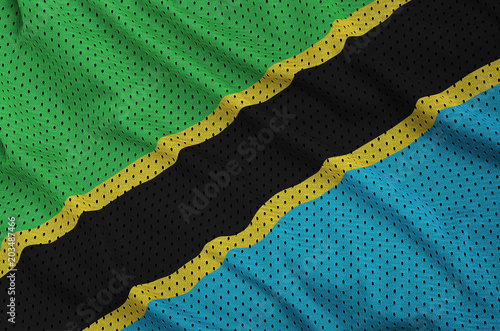 Tanzania flag printed on a polyester nylon sportswear mesh fabric with some folds photo