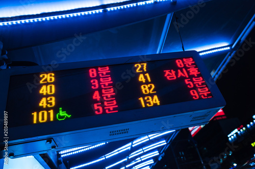 Bus stop scoreboard with route numbers