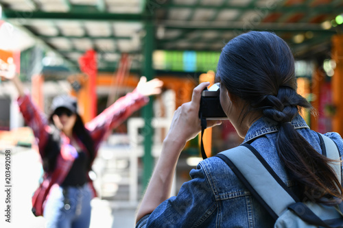 Beautiful girls are traveling abroad with fun.