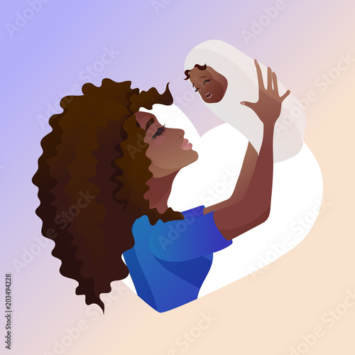 Young mother with baby in her hands.