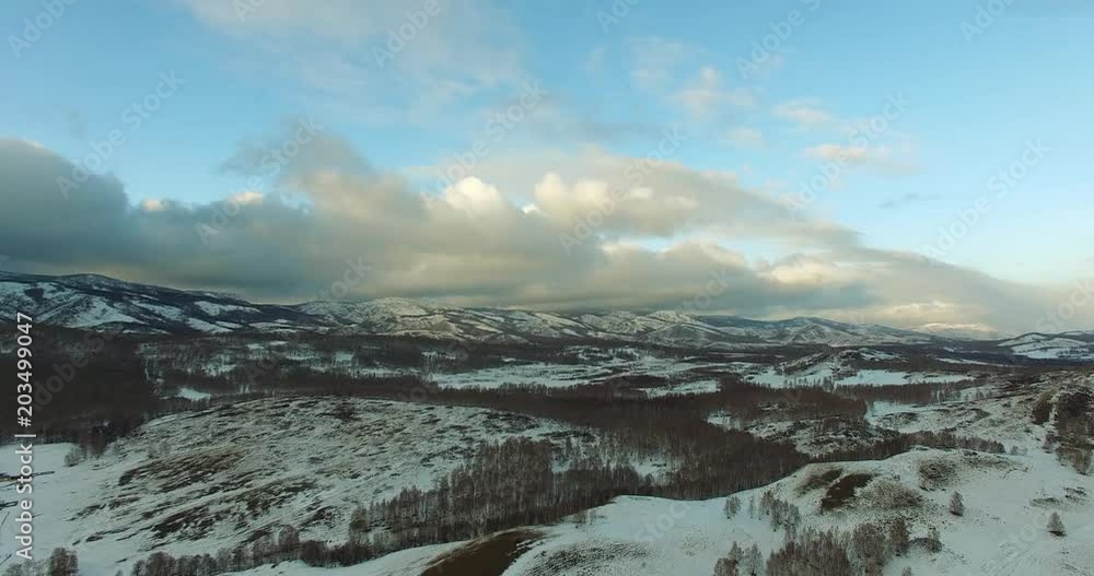 winter hilly landscape in ural mountains / russia, Bashkortostan - aerial view drone camera winter hilly landscape in ural mountains / russia, Bashkortostan - aerial view drone camera