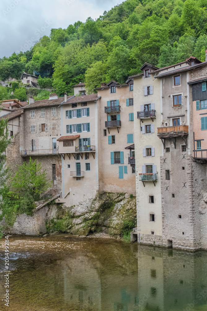 Pont-en-Royans in the Vercors, typical colorful houses built on the cliff, over the river, in France
