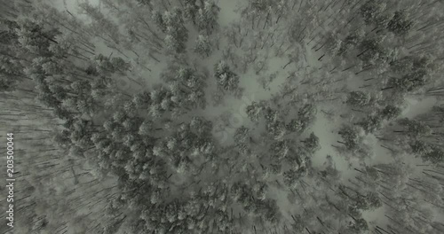 Misty Winter Over Ural Mountains Under a cloudy sky - Aerial View