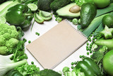 Diet Plan. Closeup Of Green Vegetables And Notebook