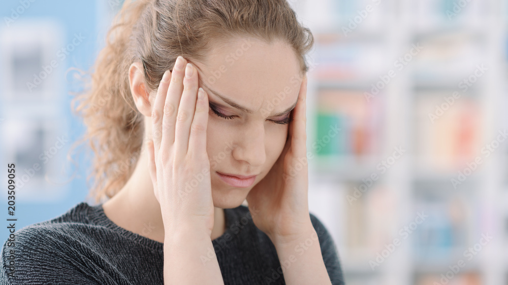 Young woman with headache Young woman with headache