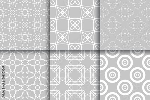 Geometric seamless gray patterns. Collection of backgrounds