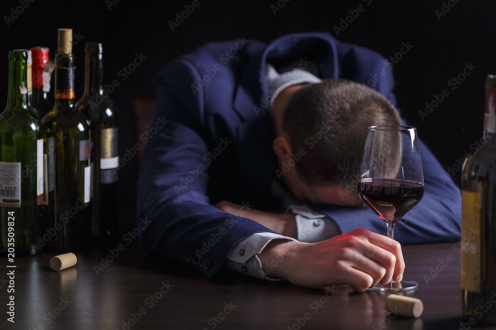 Businessman drunk by wine. Elegant alcoholic.
