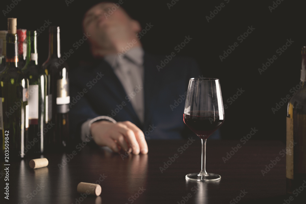 Businessman drunk by wine. Elegant alcoholic. Businessman drunk by wine. Elegant alcoholic.