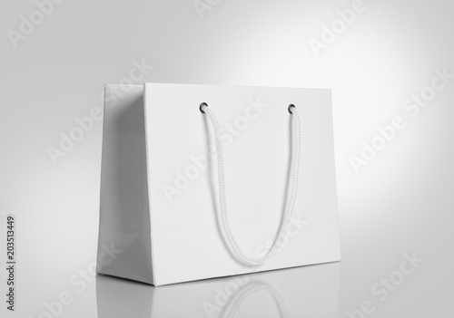White Paper Shopping Bag on gray Background for Mockups