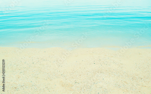 soft focus blue sea and sand beach background