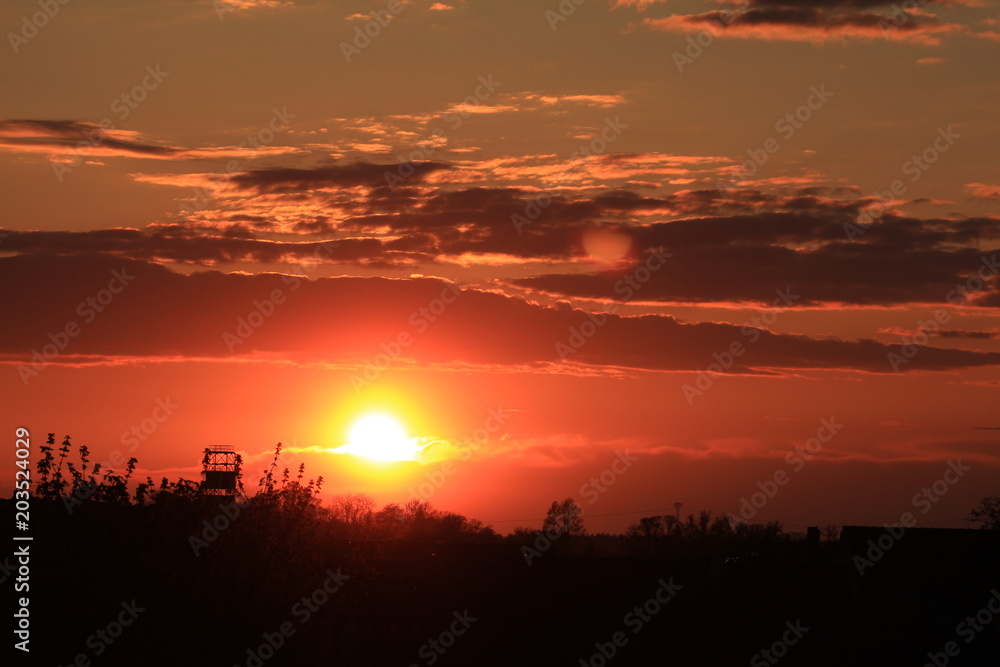 Fototapeta premium Sonnenuntergang, Abendrot mit Wolken 