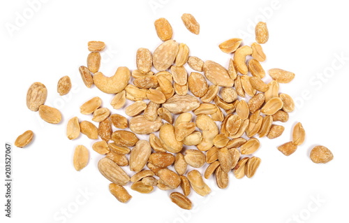 Salted and marinated peanuts with cashew nuts and almonds, pile isolated on white background, top view