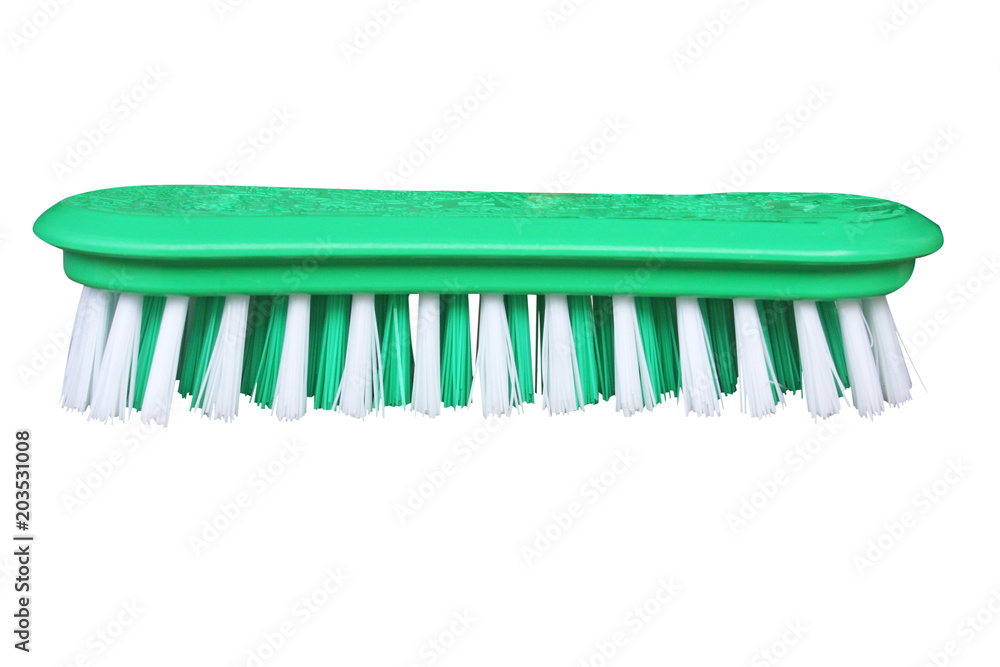 Green plastic brush with green and white bristles for cleaning clothes,Washing brush isolated on white background Green plastic brush with green and white bristles for cleaning clothes,Washing brush isolated on white background