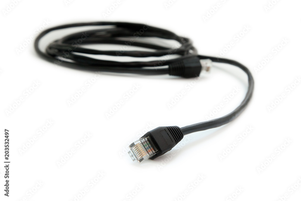 Black network cable with RJ45 connector on white background. Twisted-pair cable. A patch cable or patch cord or patch lead. Black network cable with RJ45 connector on white background. Twisted-pair cable. A patch cable or patch cord or patch lead.