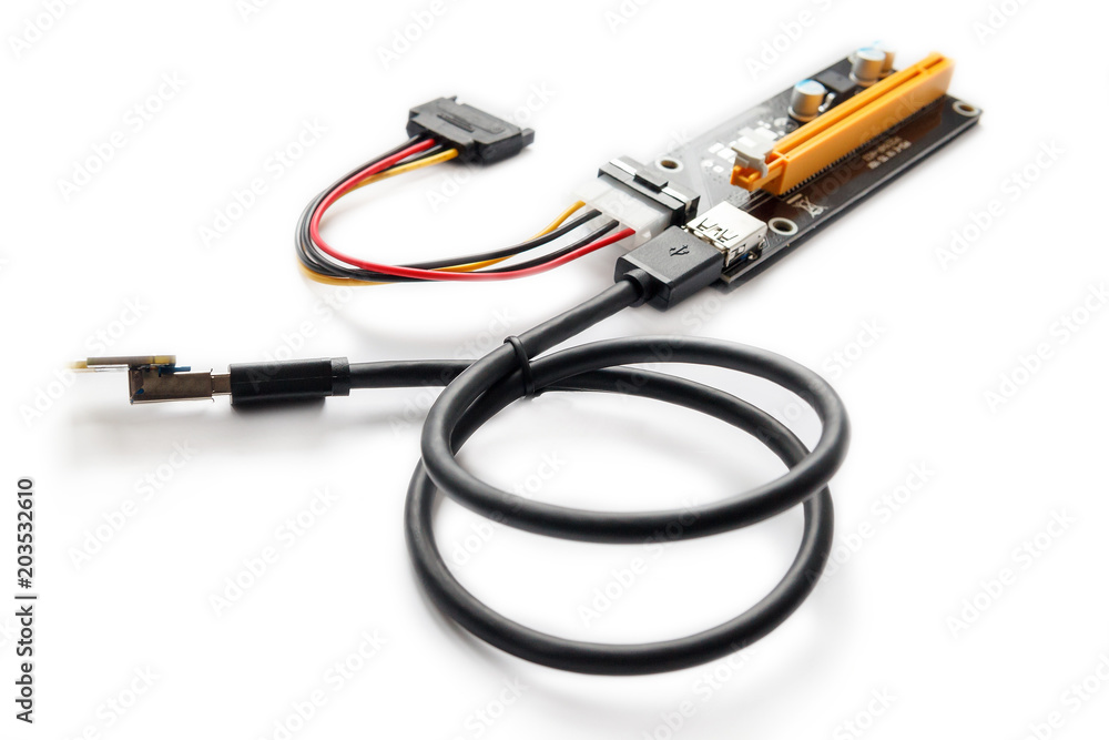 Adapter or riser PCI-E for mining on video cards. Device for adaptation 1X PCI-E to 16X slot and add video graphic cards to motherboard. Closeup on white background. Adapter or riser PCI-E for mining on video cards. Device for adaptation 1X PCI-E to 16X slot and add video graphic cards to motherboard. Closeup on white background.