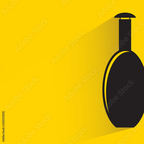 beverage bottle with drop shadow on yellow background