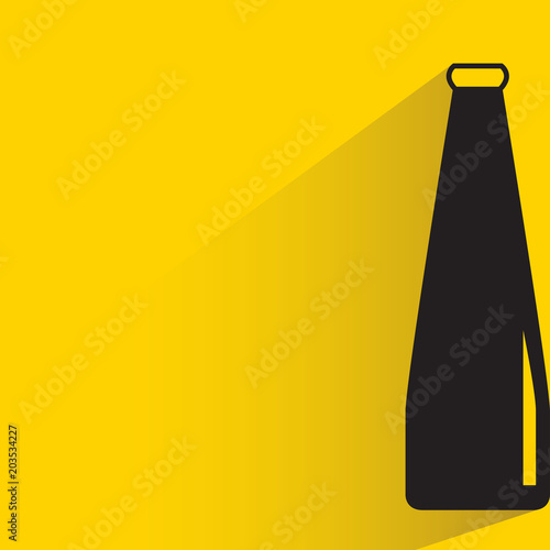 beverage bottle with drop shadow on yellow background