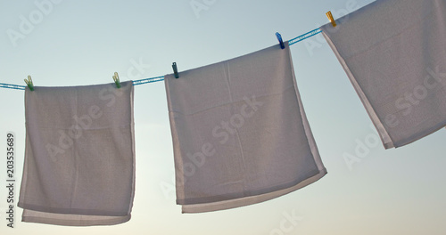 Towel dry under sunlight at outdoor © leungchopan