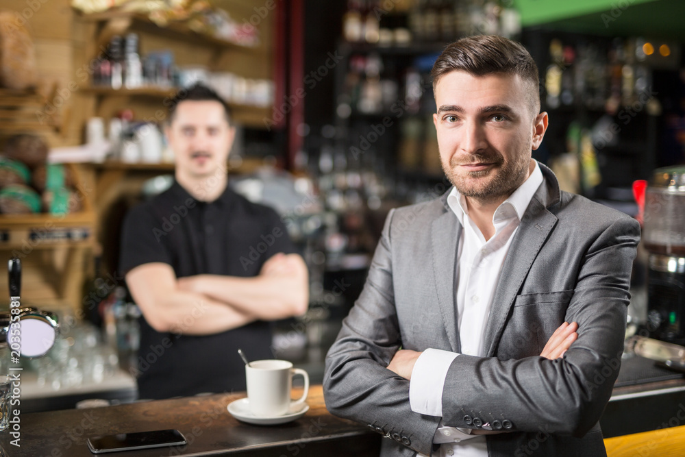 Caffe guest and barista Caffe guest and barista
