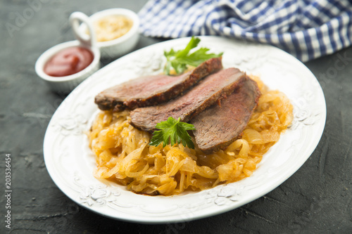 Beef fillet serves with sauerkraut