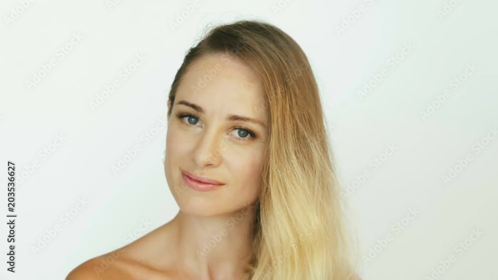 Seductive woman touching lips for application lipstick front camera Seductive woman touching lips for application lipstick front camera