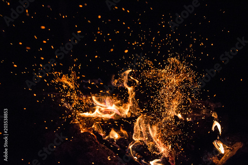 Sparks from the fire shot with the short shutter speed