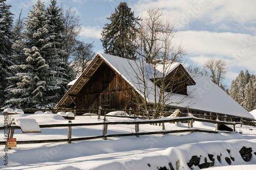 Wooden house in Alps, Switzerland © Dany