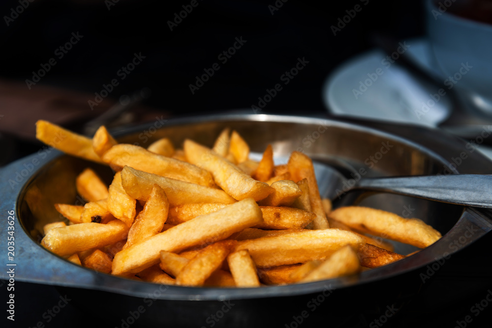 Golden French fries potatoes ready to be eaten Golden French fries potatoes ready to be eaten