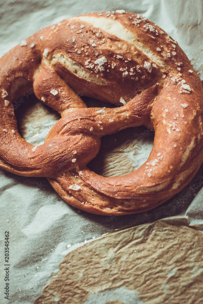 Fresh Pretzel From the Oven on Baking Sheet. Rustic Style. Fresh Pretzel From the Oven on Baking Sheet. Rustic Style.