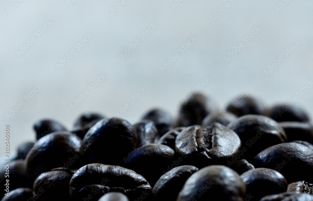 coffee beans closeup on a light background coffee beans closeup on a light background