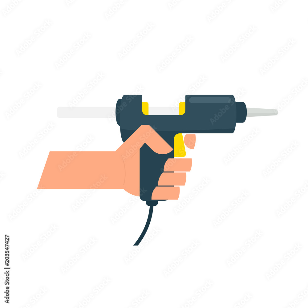 hand holding hot glue gun hand holding hot glue gun