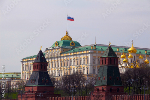 The Secret (Tainitskaya) and The First Unnamed towers of Moscow Kremlin. The Grand Kremlin Palace also Great Kremlin Palace behind the towers. Russia, May 2018.