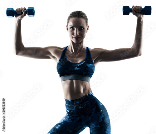one caucasian woman exercising fitness weights excercises in silhouette isolated on white background