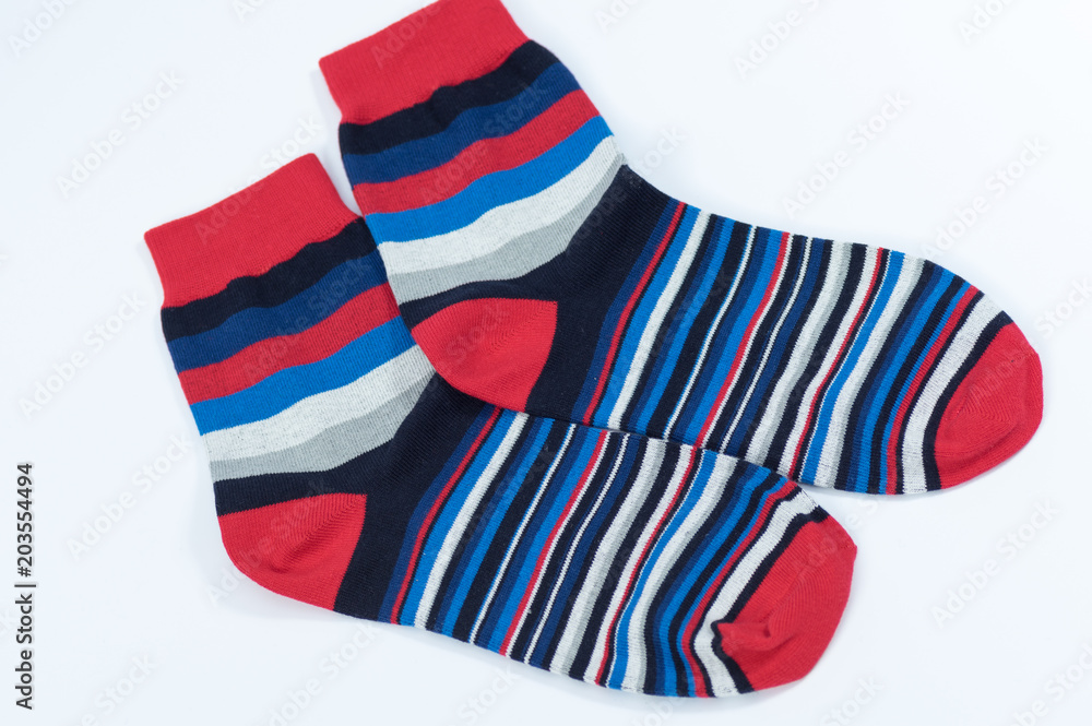 A pair of striped socks. Stripes color: red, blue, white, gray and black A pair of striped socks. Stripes color: red, blue, white, gray and black