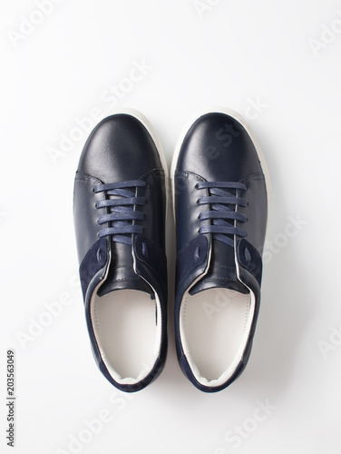 Pair of men's shoes on white background