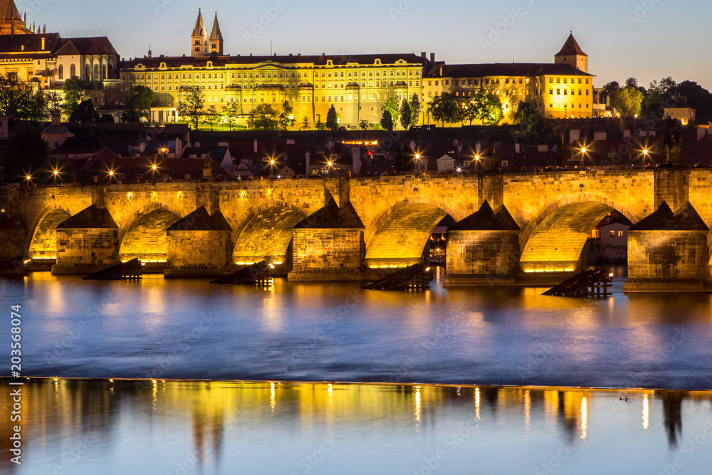Prague castle and the Charles bridge at dusk