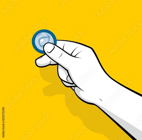 Hand holding condom