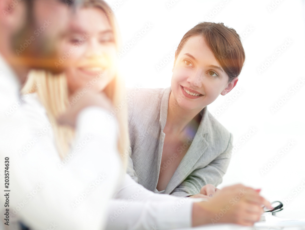background image of a business team at a Desk. background image of a business team at a Desk.