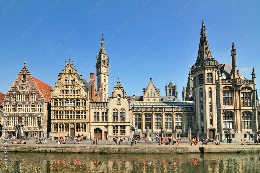 Fototapeta premium Picturesque medieval buildings overlooking the Graslei harbor on Leie river in Ghent town Belgium Europe.