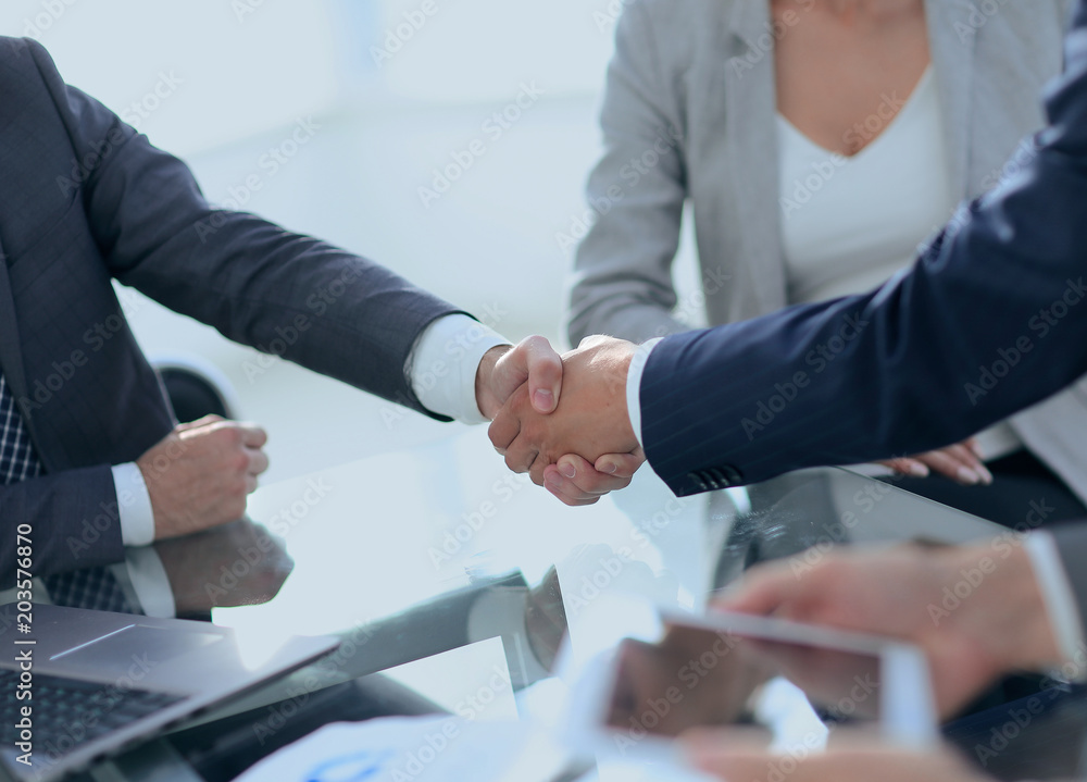 confident handshake of business partners confident handshake of business partners