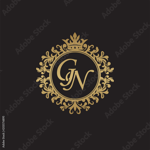 Initial letter GN, overlapping monogram logo, decorative ornament badge, elegant luxury golden color photo